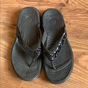 Croc sandals with rhinestones.